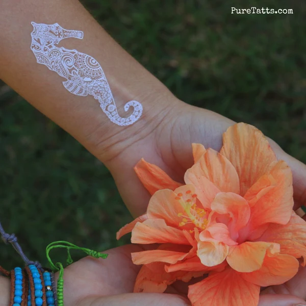 How To Rock White Temporary Tattoos At The Beach
